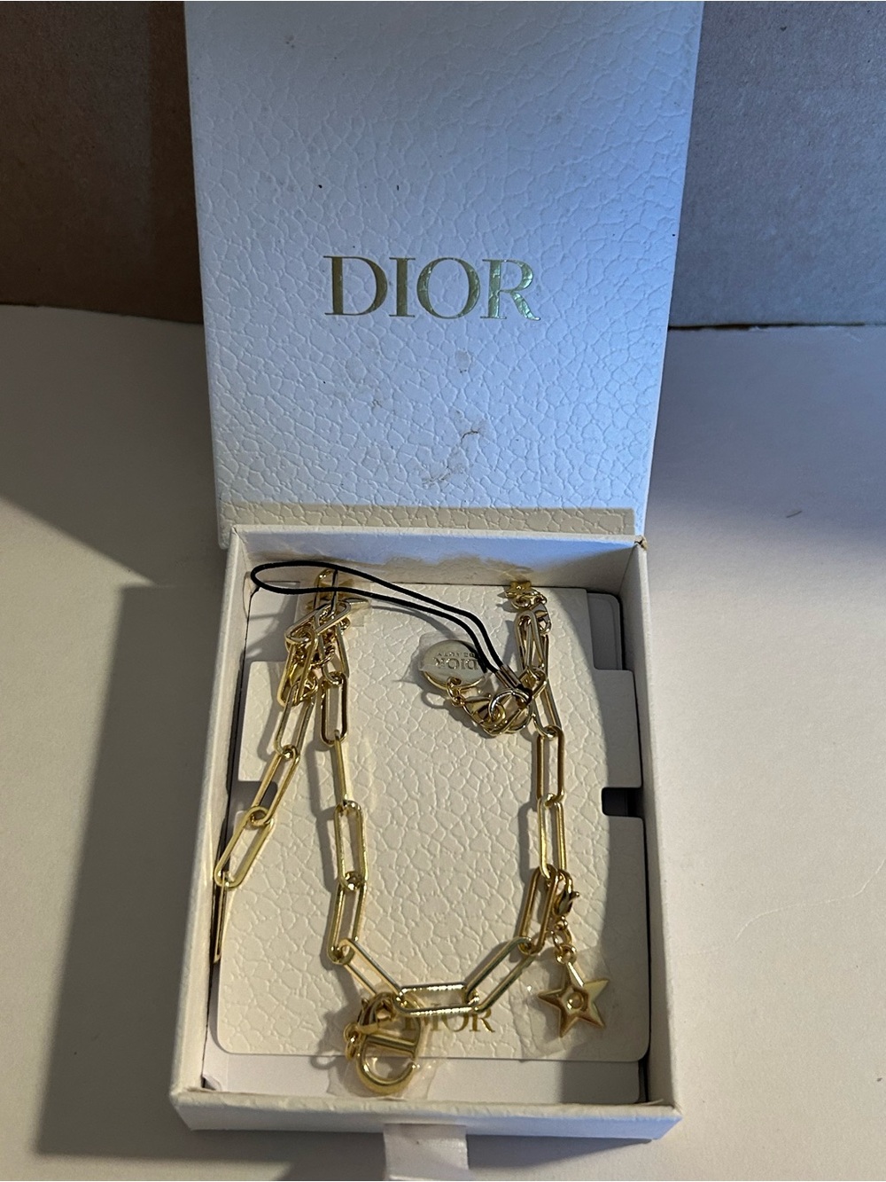 Dior Phone Accessory